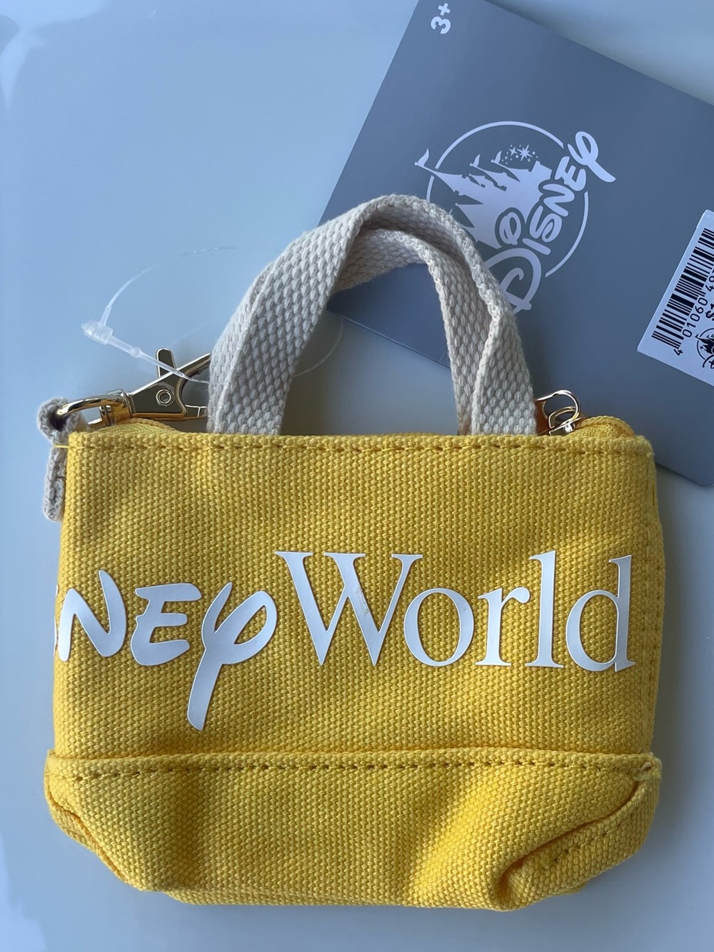 NWT Walt Disney World Logo Mania Mini/Micro Tote Bag Charm Keychain in yellow